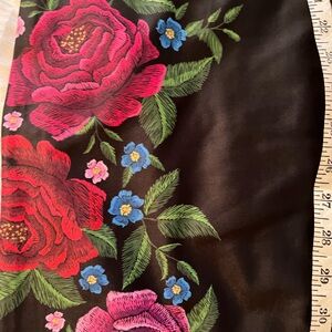 Black sleeveless dress with flower print